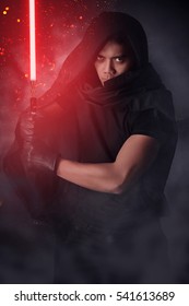 Dark Warrior Holding A Light Saber 