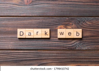 Dark Web Word Written On Wood Block. Dark Web Text On Cement Table For Your Desing, Concept.