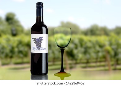 Dark Wine Bottle With Generic Label And Wine Glass On A Background Of A Green Winery Vineyard