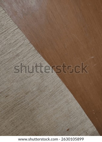 Dark wood texture peels off leaving a light colored wood texture