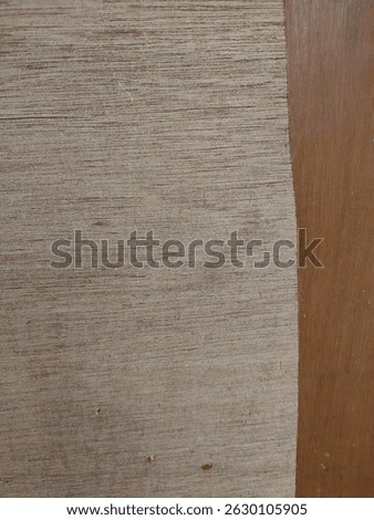 Dark wood texture peels off leaving a light colored wood texture