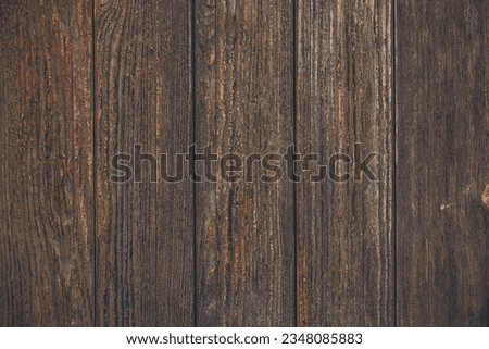 Dark wooden background, texture of brown woody board, grunge wallpaper. Old wood floor, rustic timber wall. Vintage slats, vertical pattern, natural plank surface. Weathered panel. Textured oaken door Stock foto © 