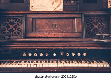 Dark Wooden Vintage Organ Instrument. Aged Organ.