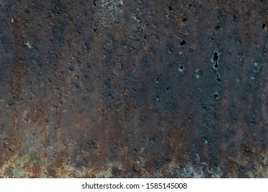 Dark worn rusty metal texture background. 