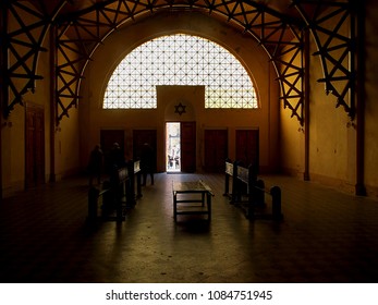 
The Darkness Of The Jewish Chapel.

Lodz, Poland - November 05, 2017
People Visit The Interior Of A Jewish Funeral Home At The Historic Jewish Cemetery In Lodz.
