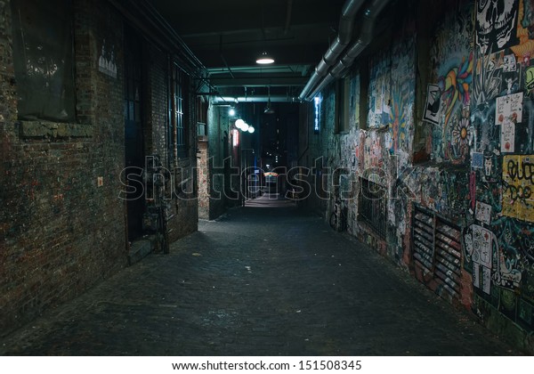 Darkness in a old grunge dirty street in the middle
of night