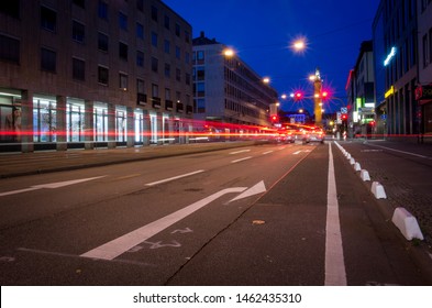 Darmstadt, Germany - July 25 2019: Long exposure of city traffic lights at night in Darmstadt, Germany.