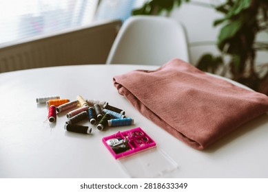 darning an old pullover by hand