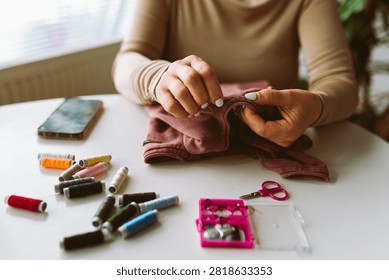darning an old pullover by hand