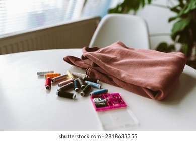 darning an old pullover by hand