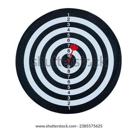 Dart arrow hit the center of target of dartboard isolated on background,Targeting and winning goals business concepts.