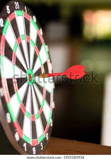 Dart is an opportunity and Dartboard is the\
target and goal.So both of that represent a challenge in business\
marketing as concept.