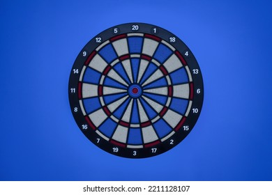 Dartboard In A Lovely Bluebackground. 