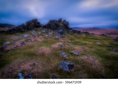 Dartmoor Tor In The National Park At Night.