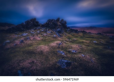 Dartmoor Tor In The National Park At Night.