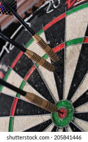 Darts Game At Pub, One Darts Hits Bulls Eye Hitting Target