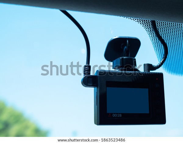 Dash camera in car\
installed on the window