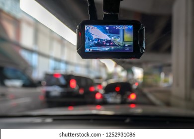 Dash Camera Or Car Video Recorder In Vehicle On The Way