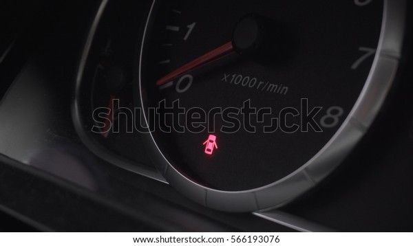 the dashboard of the car. The indicator on the\
dashboard of the car.