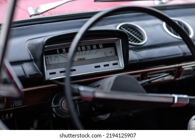 dashboard, car interior, automatic tachometer of an old red car