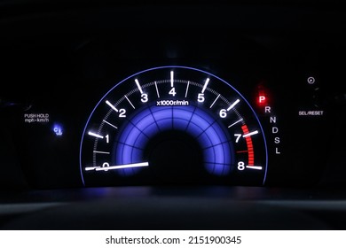 Сar dashboard close-up with tachometer during parking