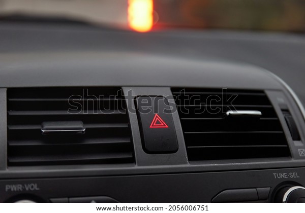 Dashboard detail with emergency hazard light\
signal button