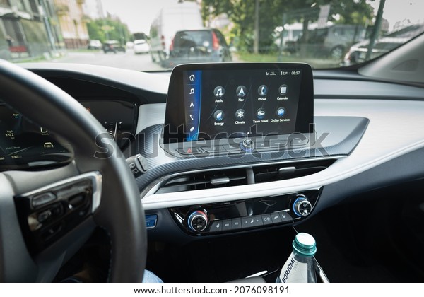 Dashboard and display of Chinese Electric\
vehicle Buick VeLite 6 on streets of Kyiv, near EV charging\
station. General Motors family next generation electric car based\
on Chevrolet Bolt\
technology