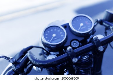 The Dashboard Of The Motorcycle And Part Of The Steering Column. Selective Focus.High Quality Photo