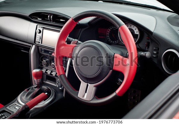 Dashboard
and steering wheel in car. Automotive
interior.