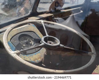 Dashboard and steering wheel of old-timer car