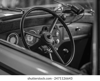 Dashboard and steering wheel of old-timer car