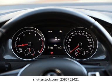 Dashboard view of a car display showing speed and temperature details