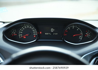 Dashboard view of a car display showing speed and temperature details