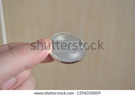Dashcoin in hand