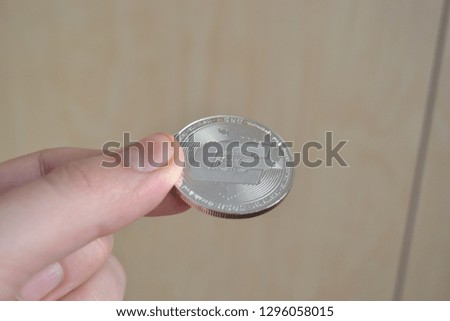 Dashcoin in hand