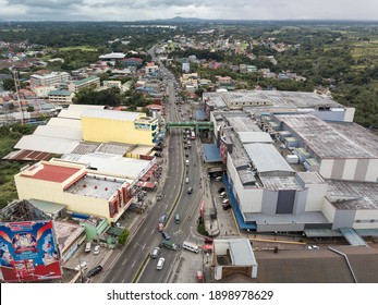 Dasmarinas, Cavite, Philippines - Jan 2021: Aerial Of The City Center And Aguinaldo Highway. Tagaytay In The Far Background.