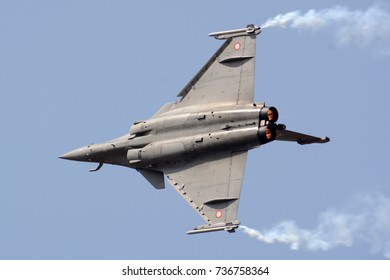 Dassault Rafale Fighter Jet Flying With Smoke Trails.