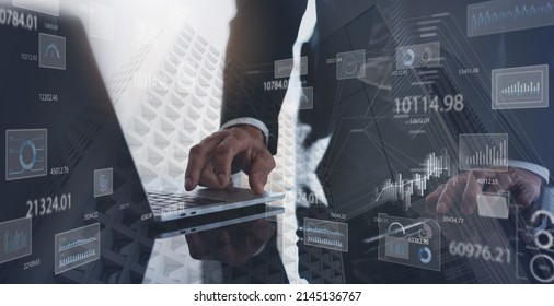 Data analysis, business analytics concept. Businessman working on laptop computer in modern office with financial graph, economic growth chart, big data on virtual screen