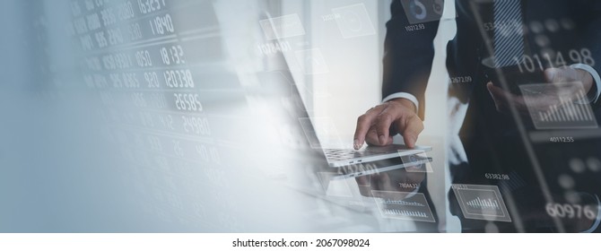 Data analysis, business finance and investment concept. Businessman working on laptop computer with financial graph, stock exchange interface on virtual screen, office background