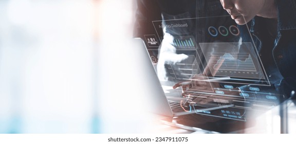 Data analysis concept. Business teamwork working on laptop with key performance indicator (KPI) dashboard on virtual screen. Business analytics, planning and strategy, data visualization