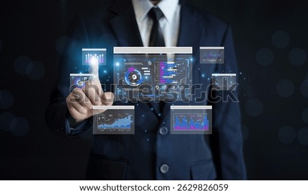 Data analysis concept. Businessman use AI technology for data analysis to optimize supply chain operations and reduce costs through intelligent automation.