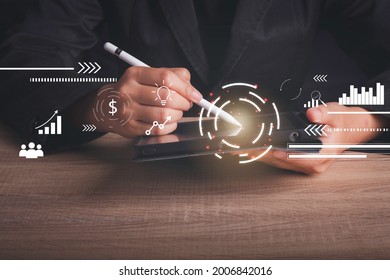 Data analysis concept. Businessman using tablet progress of business and analyzing financial and investment data ,business planning.