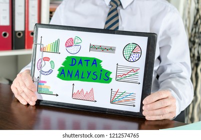 Data analysis concept shown by a businessman