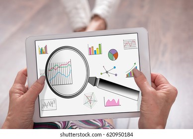 Data analysis concept shown on a tablet held by a woman