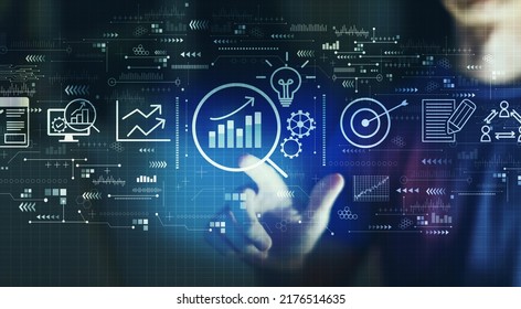 Data Analysis concept with young man touching a digital screen at night