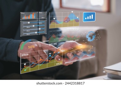 Data analysis Data Management System with KPI and metrics connected to the database investment finance, operations, sales, marketing, businessman using smartphone working with dashboard data charts