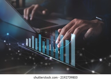 Data analysis, market research. Businessman using tablet analyzing sales data and economic growth chart, fianancial graph. Business planning and. Analysing market trade. Technology digital marketing. - Shutterstock ID 2192739803