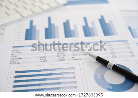Data Analysis. Pen with business report on financial advisor desk. Concept of business planning , accounting, analysis, business analysis,financial services,financial planning,