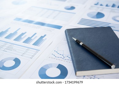 Data Analysis. pen with notebook on business and financial report. Concept of business planning , accounting, analysis, business analysis,financial services,financial planning.