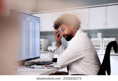 Data Analyst African Man Using Spreadsheet On Computer